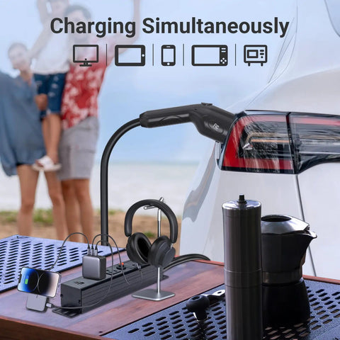 Road Ready Type One J1772 V2L Adapter For Hyundai Kia Genesis EVs With Sixteen Foot Cord charging devices at a beach setup.