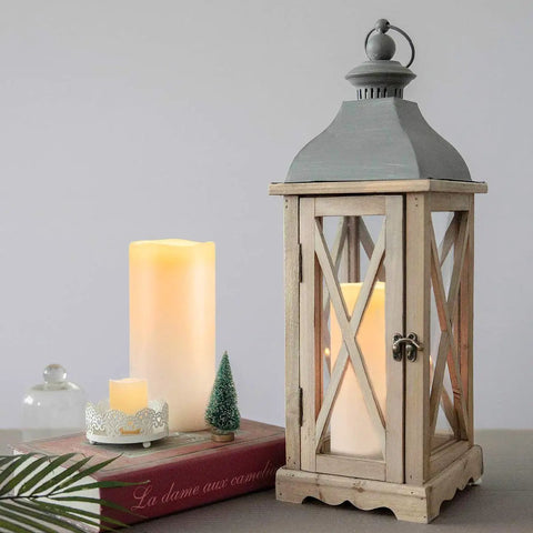 Outdoor Flameless Candles 8 by 4 Inch Waterproof Pillar Set of 2 decorating a wooden lantern with remote control and timer
