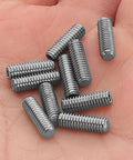 Close-up of Ten Piece Full Thread Socket Set Screw Kit With Metal Cone Point Grub Screws And Hex Socket Head in hand