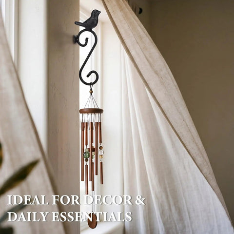 Top Notch Cast Iron Bird Wall Hooks Rustic Farmhouse Vibes Vintage Black Coat Racks For Bathroom Or Entryway Super Sturdy Decorative Key Holders Real Deal Home Upgrade Set Of Two Pieces hanging on a wall with a wind chime, showing bird design.