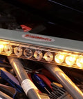 Advantage Wireless Tow Light Bar 22 Inch LED Magnetic Trailer Light Kit on a workbench with tools, illuminated lights, USA made