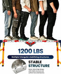 Five people standing on Built Tough Shop Workhorse Foldable Welding Table 64 X 14 Inches With Five Adjustable Height Settings And Galvanized Steel Work Surface Holding Up To 1200 Lbs For All Day Fabrication.