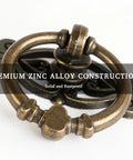 Antique Bronze Ring Pull Handles Set Of 8 With Ornate Backplates For Furniture Restoration, close-up of vintage ring pulls.