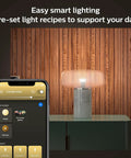 Smart Home Lighting Starter Kit With Bridge, 1 Smart Button, And 3 Soft Warm White A19 LED Bulbs, app control displayed on phone