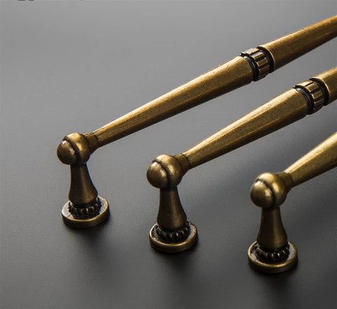 Close-up of Vintage Antique Bronze Cabinet Handles And Drawer Pulls For Kitchen Cupboards, Retro Style Knobs For Doors And Furniture, Classic Hardware