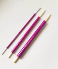 Versatile Fabric Tube Turner Set For DIY Sewing With Three Cylinder Sizes One Sixteenth Inch Three Eighths Inch And One Half Inch Plus Ball Point Bodkin Drawstring Threader For Easy Tube Turning And A Handy Must Have Tool Bundle, shown with purple cylinders and bodkin tool.