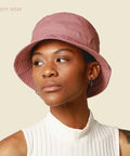 All Day Cotton Bucket Hat With Adjustable Comfort Strap For Beach, Golf, Fishing And Outdoor Fun in dusty rose on model