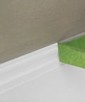 Multi Surface Painter's Tape With PaintBlock Technology Pro Grade 1 Inch Wide 0.94 In By 60 Yds Green applied on trim for sharp lines