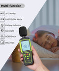 Person using Portable Decibel Meter With 30 To 130 dB Range, 5 Measurement Modes, Backlit LCD Display, MAX MIN Readouts, near sleeping child