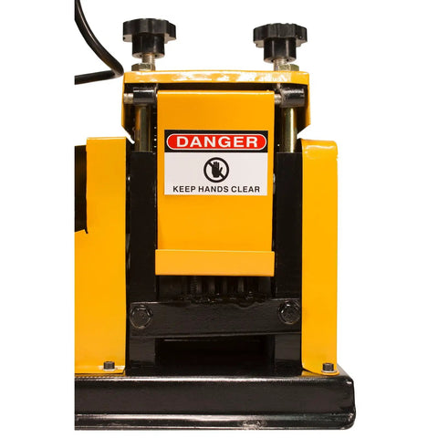 Close-up of WRA20 Wire Stripping Machine Pro Grade Benchtop Auto Driven with caution sign visible on yellow casing.