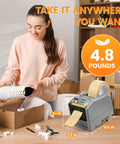 Automatic Tape Dispenser And Ribbon Cutting Machine Offering No Sweat Quick Precision Trimming Portability For Shipping Packing Schools And Retail Stores, 4.8 lbs, 10.6x5.5 in, ergonomic design in use during packing.