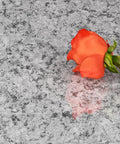 Granite Look Countertop Contact Paper Peel and Stick Vinyl Wrap with red rose, showing waterproof and oil proof surface.