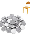 Set Of 48 Self Adhesive Felt Furniture Glides 25 mm Diameter Scratch Resistant Floor Protectors beside a chair