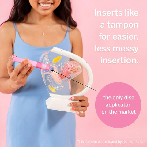 Woman holding menstrual disc applicator demo in Menstrual Disc Starter Kit With Medical Grade Silicone All Inclusive Set Includes Medium And Large Discs Applicator Lube Wash Sterilizing Carry Cup And Wipes For A No Mess Tampon Alternative Period Care