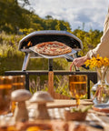Koda 16 Inch Propane Gas Pizza Oven With 28 MBAR Regulator And Hose Outdoor Portable Oven in use baking pizza