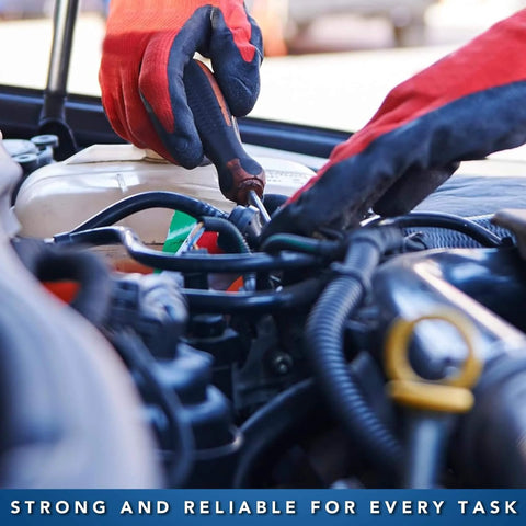Close-up of a person using tools on automotive machinery