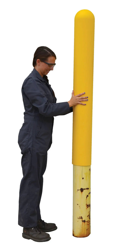 Person installing Slide On Yellow Bollard Post Cover For Warehouses Made From Durable Low Density Polyethylene Thermoplastic.