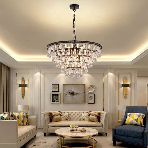 Black 24 Inch Crystal Chandelier With 5 Tier Raindrop Cascades Adjustable Hanging Pendant Light in a modern living room