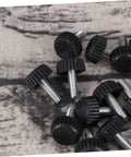 20 Pc Adjustable Furniture Feet With Threaded Plastic Glides showing steel core plastic base black glides on fabric surface.
