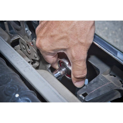 Hand using Three Eighths Inch Drive 72 Tooth Gimbal Ratchet Built For Tight Spots With Five Degree Swing Arc And Anodized Aluminum
