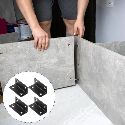 Man assembling furniture with Built To Last Heavy Duty Stainless Steel L Shaped Corner Braces Set Of Four with screw holes