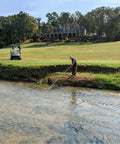 Golfer using 18 Foot Telescopic Golf Ball Retriever With Lightweight Aluminum Shaft Stainless Cup And Locking Hinged Design