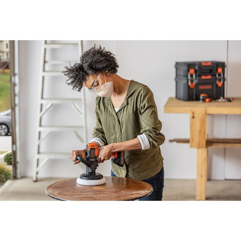 Person using Matrix 20V Max Buffer Kit For Cars Floors And Furniture With 3500 RPM Random Orbital Polisher, Cordless Power Unit, Battery