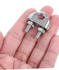 Heavy Duty Stainless Steel Wire Rope Cable Clamp U Bolt Fastener For 6mm Line held in hand, showcasing metal grip and design.