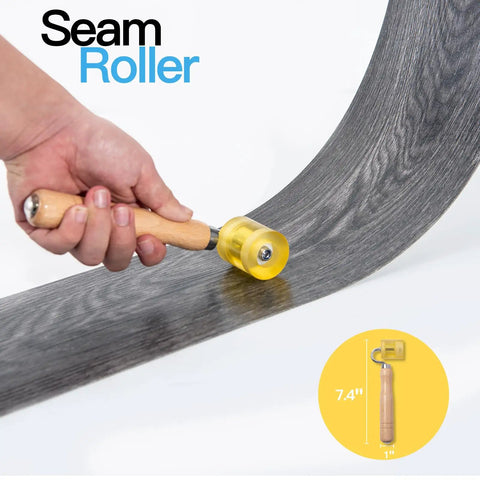 Hand using seam roller on curved surface, highlighting Peel And Stick Wallpaper Backsplash Application Tool Smoothing Kit With Light Yellow And Blue Squeegees And Craft Knife Blades For Quick Clean Install Ideal For Vinyl Wrap Backsplash Tile Window And Trim Projects