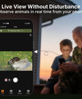 Live view on phone showing raccoon in outdoor scene with people enjoying nature, Slick Non Cellular Wifi Trail Camera With Dual Antenna And Beefy 7800 Mah Battery Slings A Lightning Fast Trigger Shot With Killer 64 Mp Pics And Crisp 1296 P Hd Video Plus Ready To Go Memory Card For Zero Headache Outdoor Scouting.