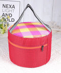 Red plaid insulated cooler bag with handle, round shape, zipper closure, ideal for picnics on white blanket.