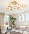 6 Light Brushed Gold Semi Flush Mount Ceiling Light Fixture in modern bedroom with natural light and cube style glass shades