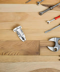 Heavy Duty Stainless Steel Trailer Door Hinges For Box Trucks Are Literally Bulletproof and built different on a wood table with tools.