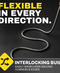 BIONIC STEEL 10 ft metal garden hose extension; flexible interlocking steel coil being held.