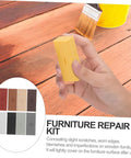 Hand holding wax stick from Floor And Tile Repair Wax Kit For Porcelain And Ceramic Tiles Quick Drying Hard Wax Filler For Chips And Scratches