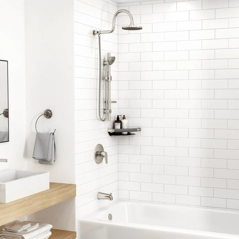 Bathtub Spout Valve With Diverter For Brushed Nickel Finish Half Inch Slip Fit Connection in modern bathroom setting
