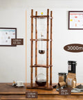 Portable 3000Ml Cold Brew Coffee Maker With Adjustable Stainless Steel Valve For Smooth Low Acid Iced Coffee on wooden base.