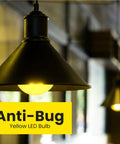 A19 Outdoor Bug Light LED Bulb, 60 Watt Equivalent, Non-Dimmable, E26 Base, emitting yellow light in a fixture
