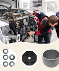 Two mechanics inspecting a car engine with Tough As Nails Car Bushing Installer Set Professional Metal Sleeve Press Kit nearby.
