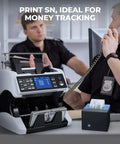 Thermal Printer For Mixed Denomination Money Counters, Plug In And Print Totals By Value And Quantity, Denomination Breakdown And Serial Numbers, Compatible With IMC01 IMC08 Banknote Counters, Fast Receipt Printing, shown in use next to a money counter in an office setting.