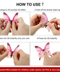 Hands demonstrating application of 96 Pcs 3D Glow In The Dark Butterfly Wall Decor Removable Stickers with adhesive for walls.