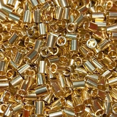 Ten Piece SMT Soldering Copper Nuts And Precision Bearing Sleeves For PCBs Threaded Through Hole Welded Brass Hardware Solid 2mm Bore Straight Up Durable Workhorse Smooth Threading Rock Solid Fit Electronics Assembly Kit close-up of brass sleeves