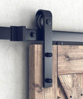 Close-up of installed 8 Ft Double Barn Door Hardware Kit For 24 Inch Wide Doors Ultra Smooth Quiet Sliding Track With J Shape Hanger