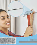 Person using a hammer with a double headed skirting nail in a wall, featuring 250 Pack Double Headed Skirting Nails Made Of Premium Carbon Steel.
