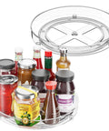 2 Pack Nine Point Five Inch Lazy Susan Turntables For Cabinet Pantry Refrigerator Organizer Non Slip 360 Degree Spin, filled with jars