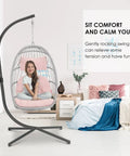 Pink Egg Chair With Stand For Indoor Outdoor Chillaxing, Swinging Wicker Hammock Chair in a modern bedroom setting with UV cushion