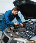 Pro Level 18 Piece Universal Radiator Pressure Testing Kit With Thirteen Heavy Duty Coolant Adapter Fittings in use on a car engine.