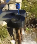 Ready-To-Go 3KW Single Phase Axial Flow Hydroelectric Generator Kit 220V Water Power Generator in outdoor river setting