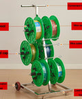 Heavy Duty Wire Spool Rack On Wheels showing green spools, stainless steel frame, convenient handle, and anti-vibration wheels.
