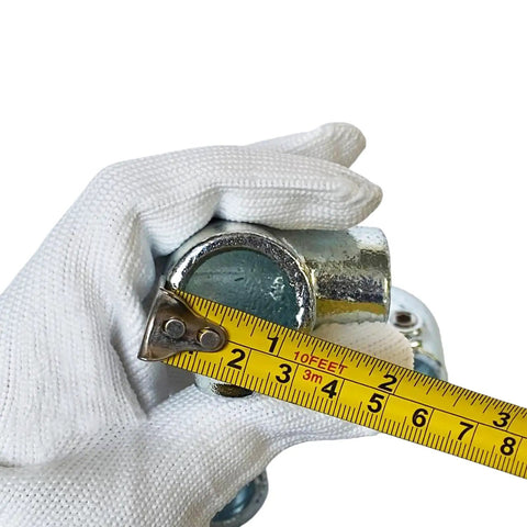 Person measuring 4 Pack 1/2 Inch Galvanized Pipe Fittings 90 Degree Elbows Malleable Iron Slip On Connection for DIY projects